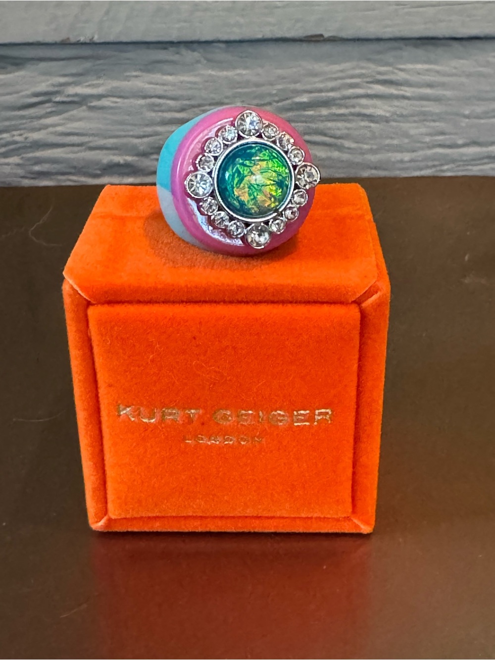 Kurt Geiger Multicolor Enamel Ring with Green Iridescent Center